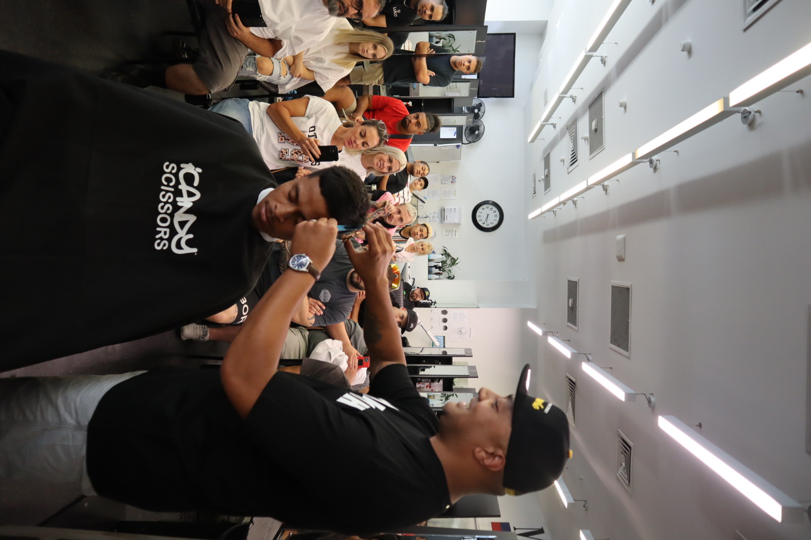 Vea Fonua demonstrating a haircut